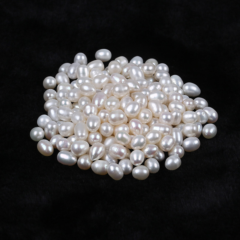 Beads from white river pearls, bead 5-6 mm