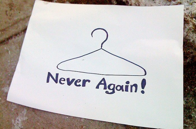 The wire hanger is symbol that is synonmous with unsafe abortions. This is a poster from a university campus protest.
