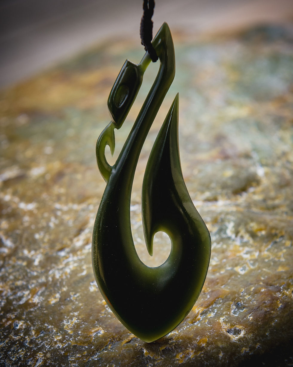 Miniature : Wyoming Olive Manaia Pendant front view backlit