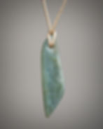 Blue nephrite drop pendant, reverse side with soft clouding