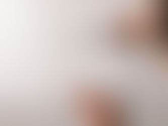 man regrouting ceramic tiles