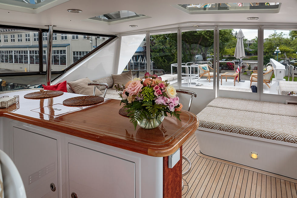 Blackwood’s flybridge bar with sleek countertops, premium seating, and panoramic ocean views for sunset cocktails.
