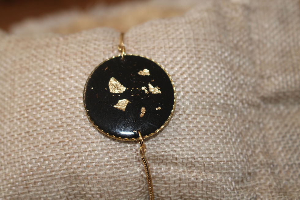 Bracelet rond noir doré