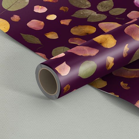 A seamless pattern created using pressed rose petals and leaves.  Mocked up as wrapping paper