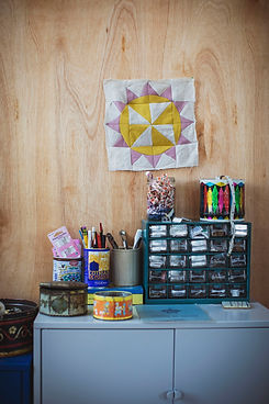 sewing tool and a quilt on wall.jpg