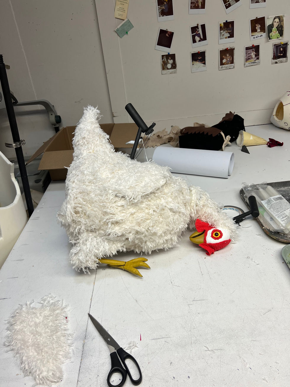 I added the feathers to the rear of the chicken. 