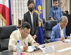 Noel Felicia Signing Contract.jpg