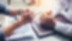 Executives reviewing governance policies and risk oversight as part of board governance consulting and leadership alignment discussions