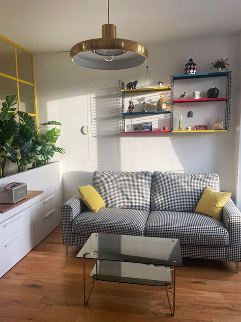 cosy living room on small space with primary colors