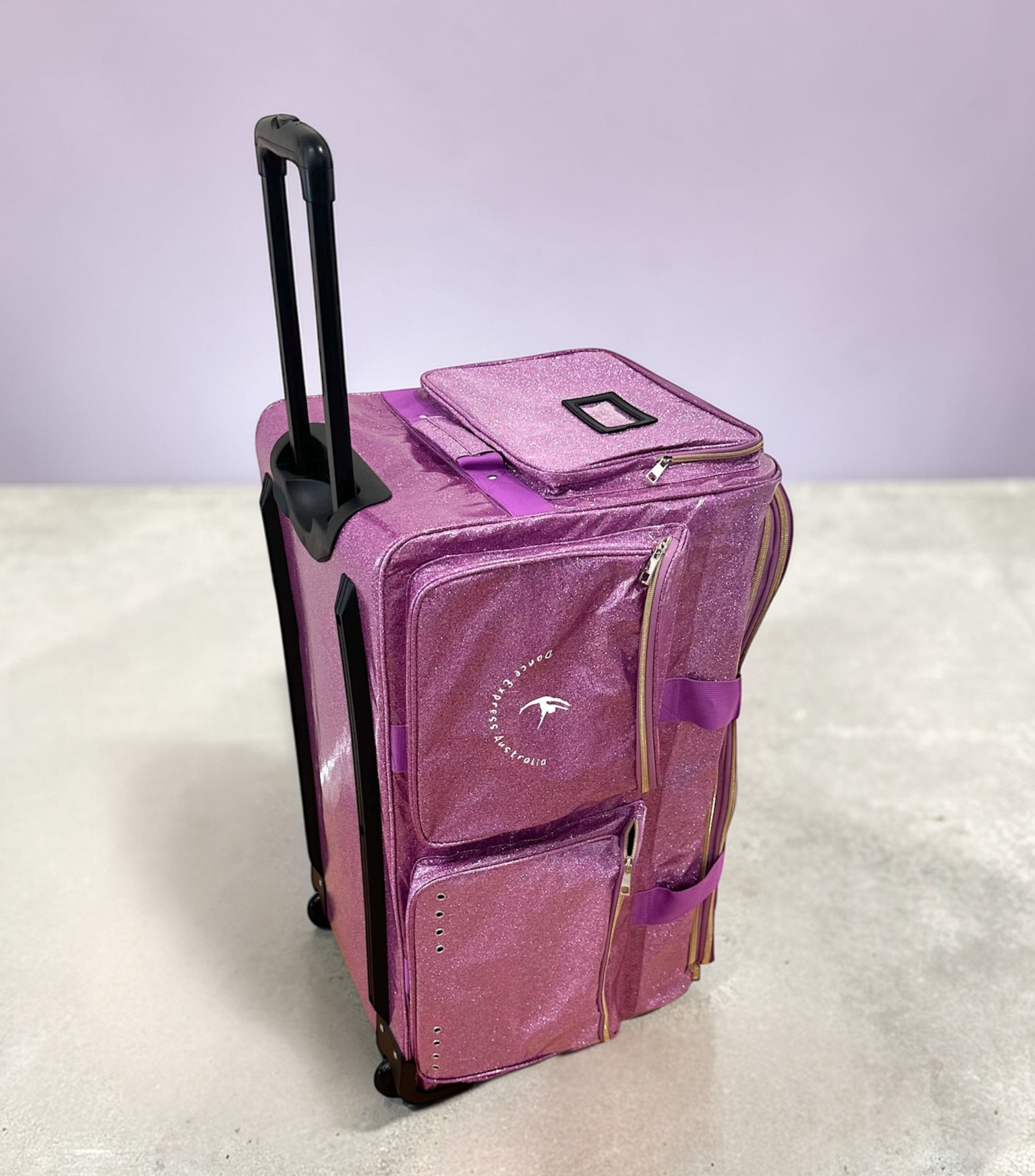 Purple glitter dance bag with built-in garment rack for competitions and dance storage