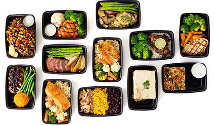Assorted Healthy Coast Meals in black meal prep containers showcasing fresh, balanced food options in Destin, Crestview, and Fort Walton Beach, Florida, recommended by FIT30A for nutritious grab-and-go dining.