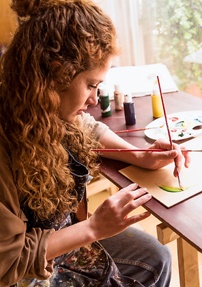 girl-painting-canvas-art-studio.jpg