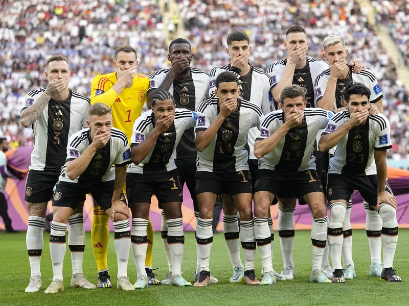 footballnews.footballmamak.com/german-players-cover-their-mouths-at-the-world-cup-to-protest-fifa
