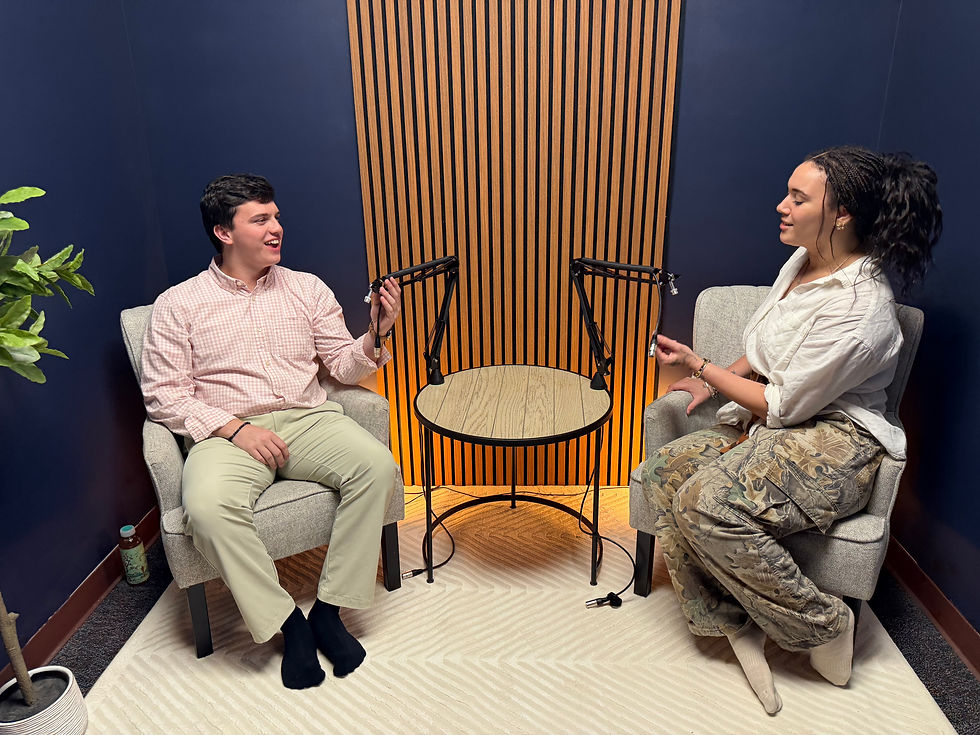 Student interns Drew and Rachel discuss their latest project in the newly constructed studio they meticulously designed and built after extensive research.