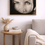 Miniatura: Monochrome fine art portrait displayed in a modern interior, framed black and white artwork with a realistic female face.