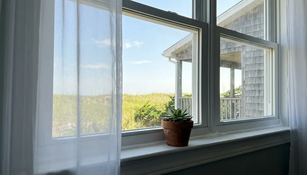 Freshly sealed window in a sunny Ocean City, MD beach house, an example of how to weather proof windows