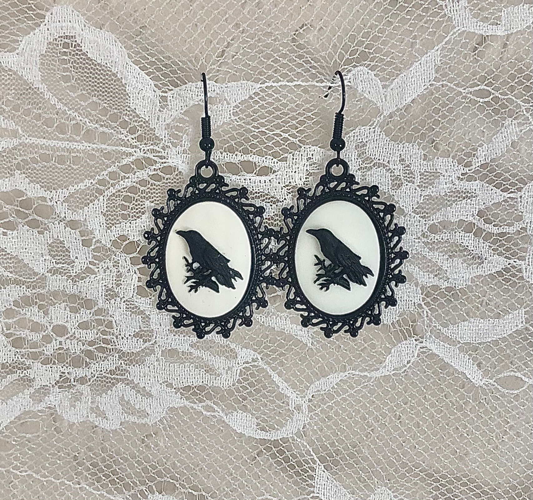 Raven cameo earrings-white