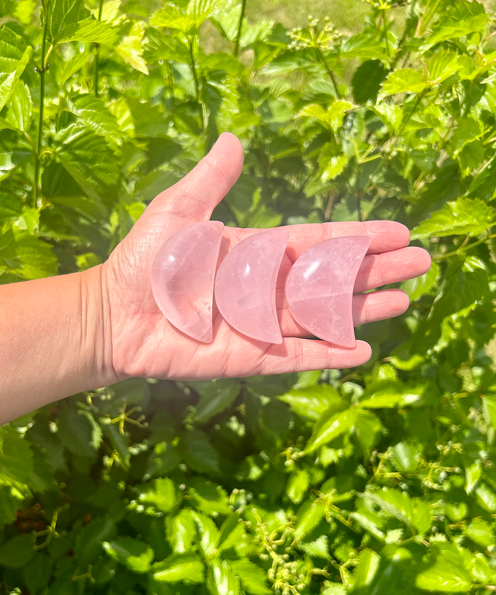 Natural rose quartz moon carving