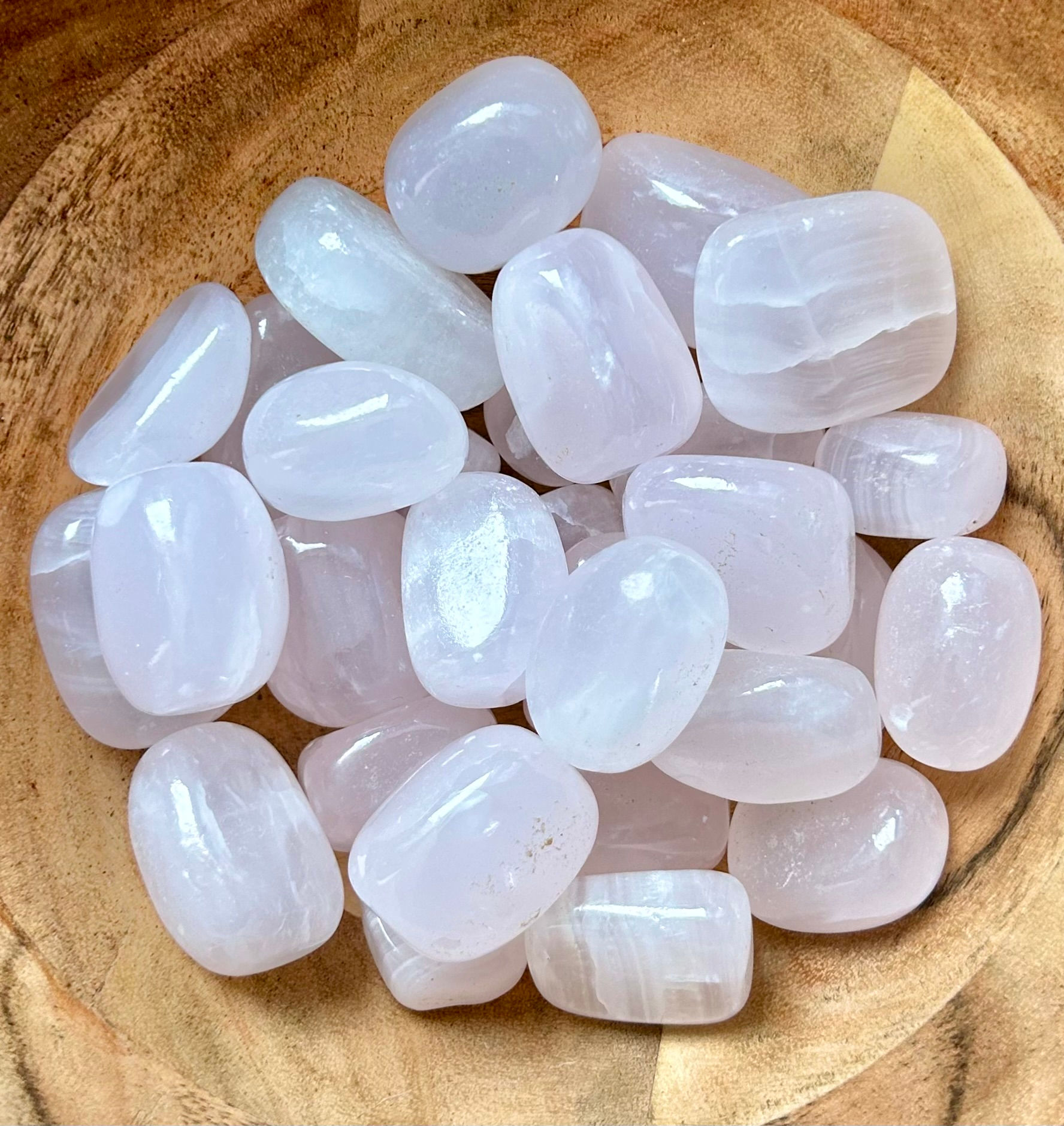 Natural pink mangano calcite tumble