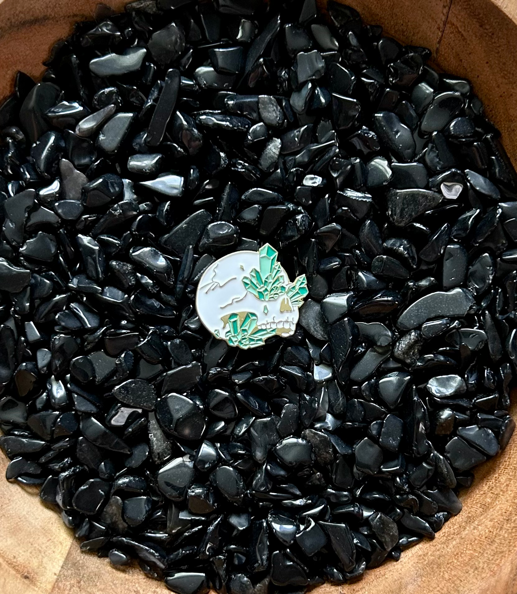 Green crystal skull enamel pin