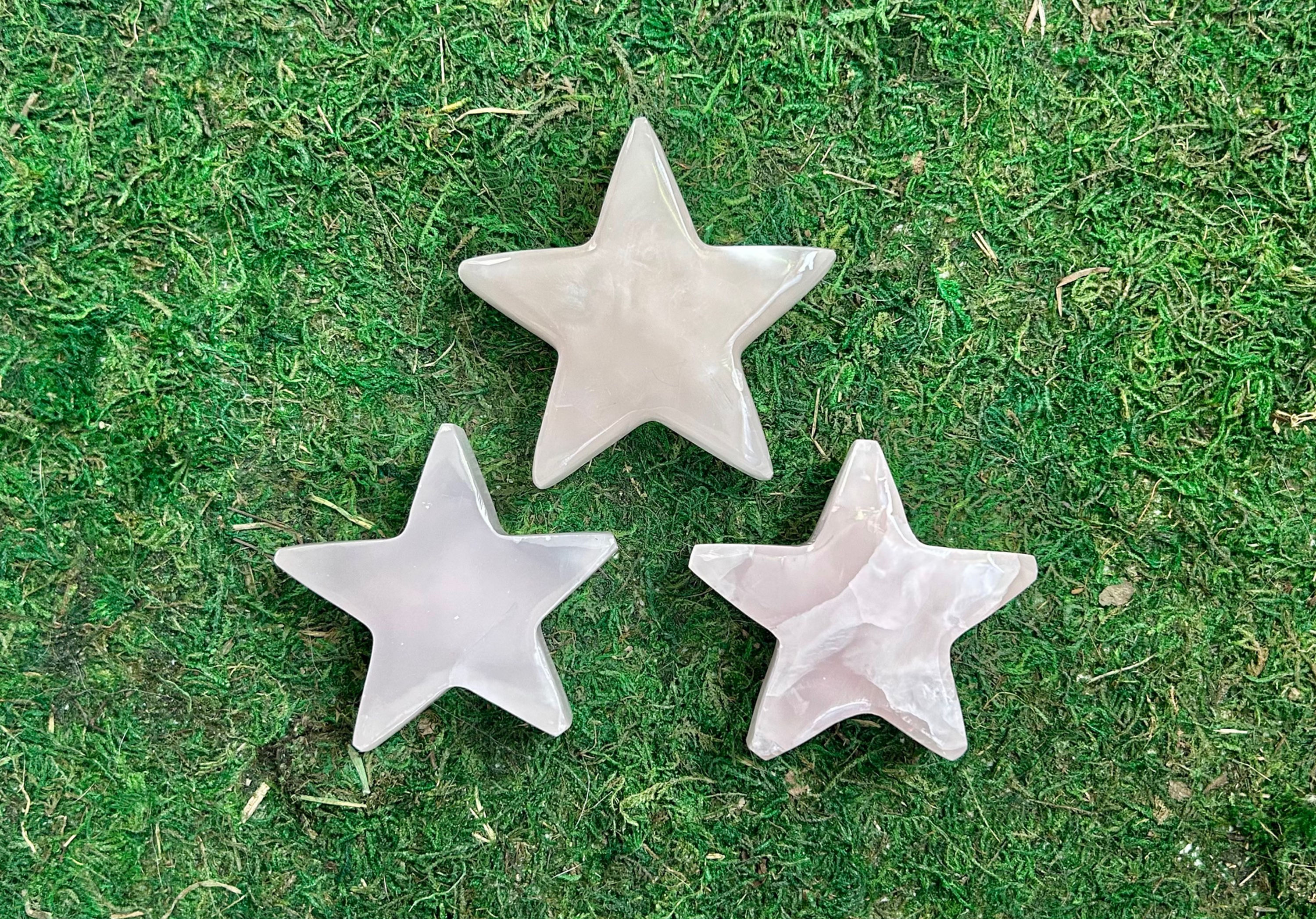 Natural mangano calcite star carving