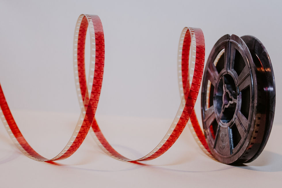 A picture of a roll of film together with an article about film festivals in Sweden.