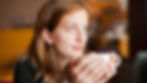 A woman drinking green tea
