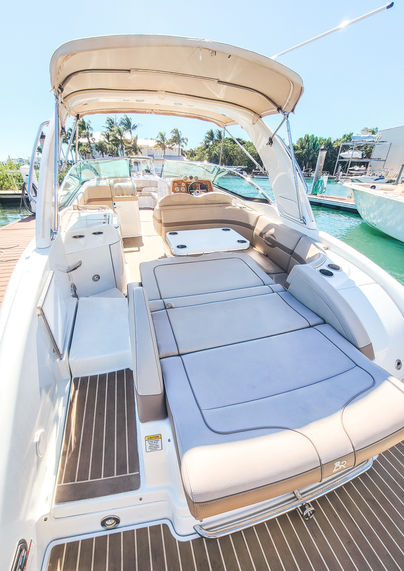 The convertible seating at the back of our boat transitions to a full sun pad.