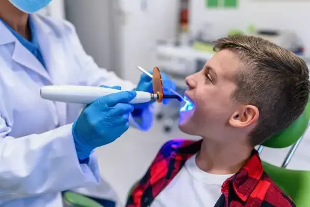 Gyermek tejfog tömve üvegionomer anyaggal