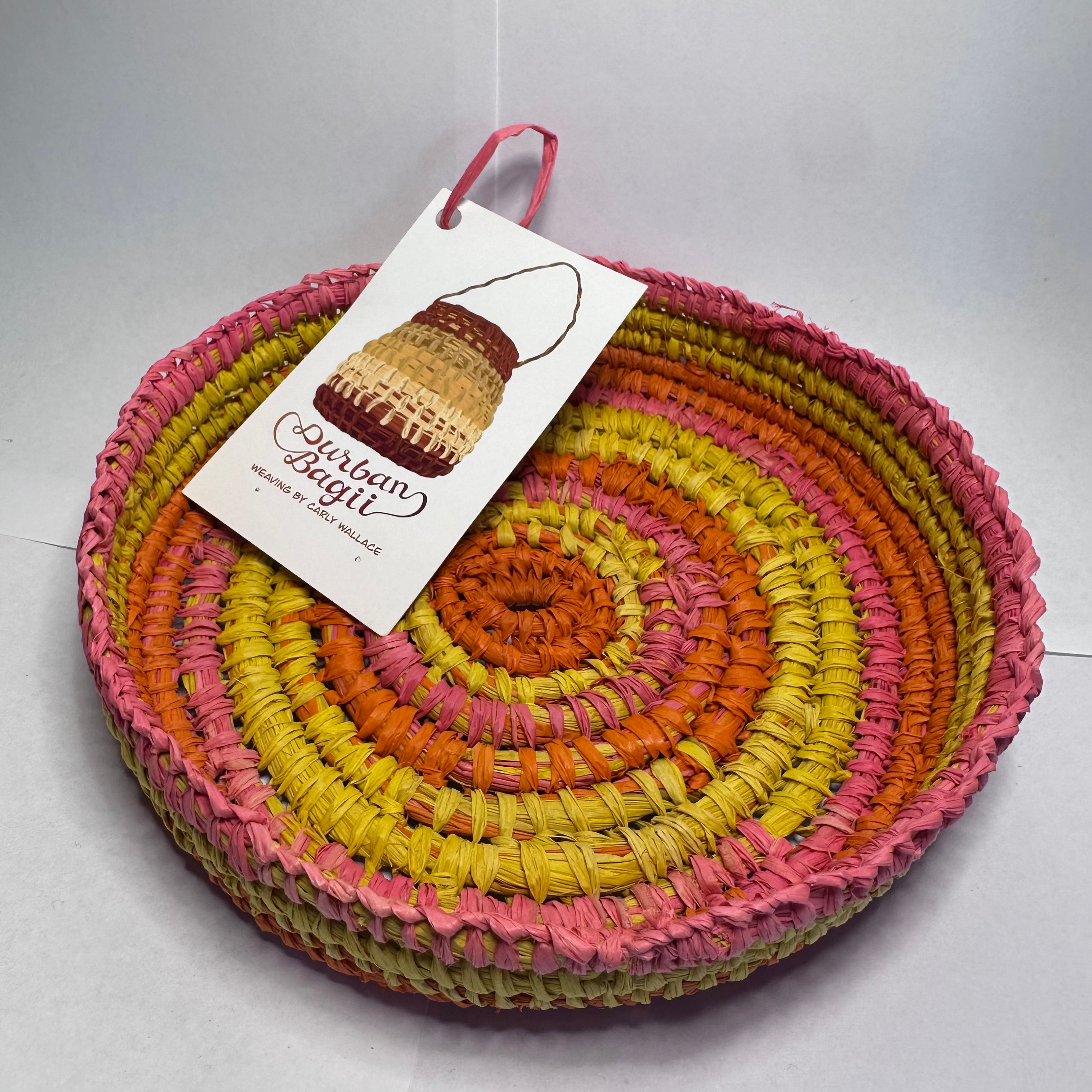 Pink on yellow and orange gani (coil) bowl