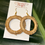 Thumbnail: Palm tree natural string hoop earrings 