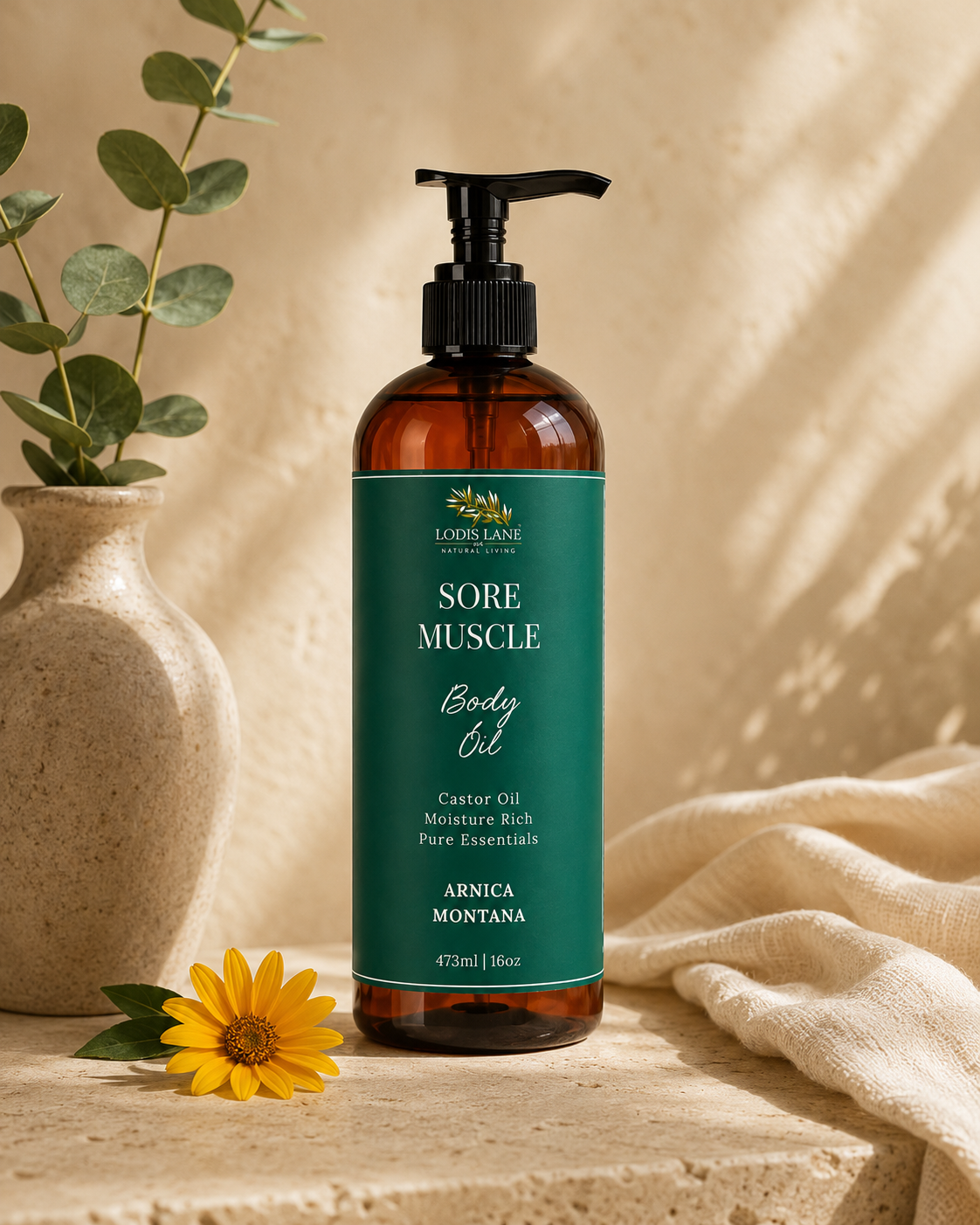 Lodis Lane Natural Living Arnica Montana Sore Muscle Body Oil in amber bottles with botanical green labels