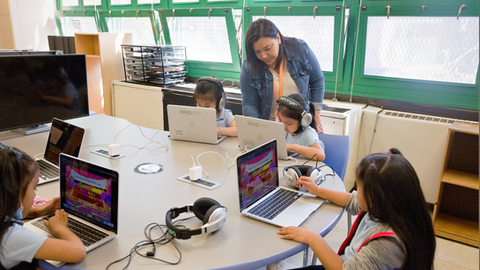 technology lab with students and teacher