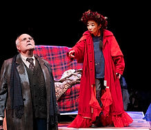 2. (L-R) Mike McShane (Scrooge), Keiko Shimosato Carreiro (Present) (Custom).jpg
