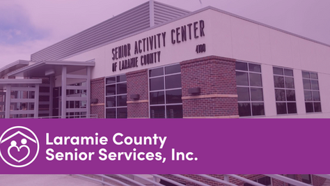 Exterior of the new Laramie County Senior Center building with logo, a community hub supporting dementia care and caregiver socialization.