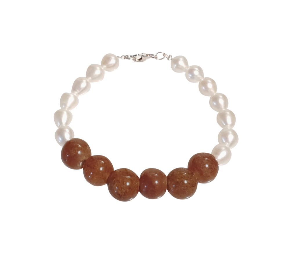 Armbånd med orange jade og perler