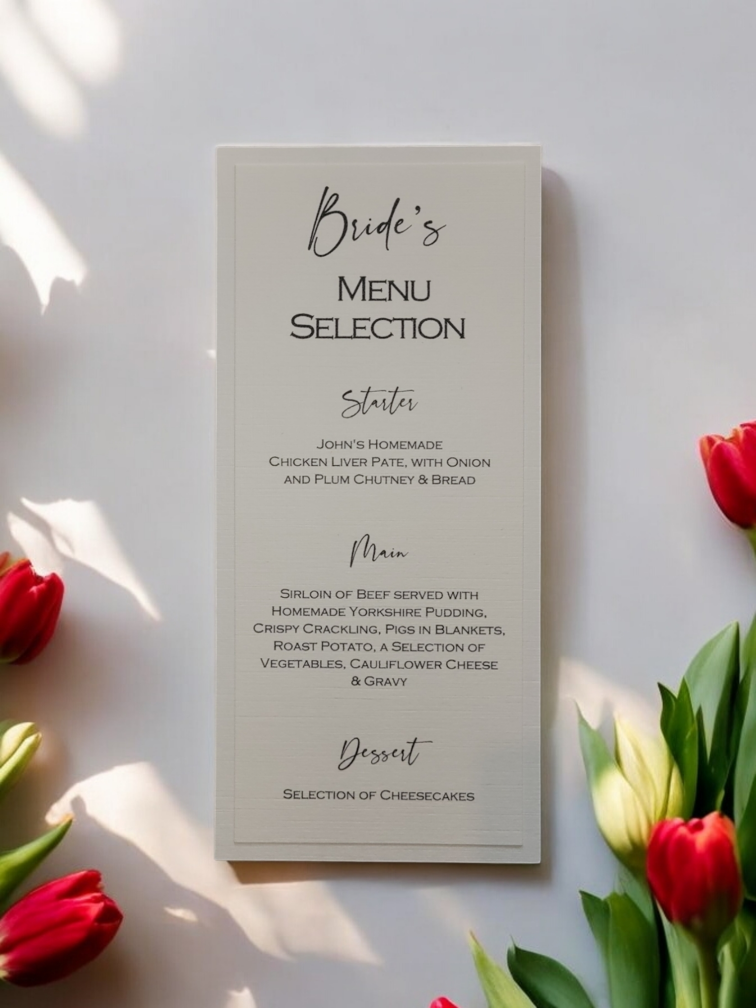 Modern Script Design Menu Card has the guest’s name at the top in script and their menu choices are printed below.