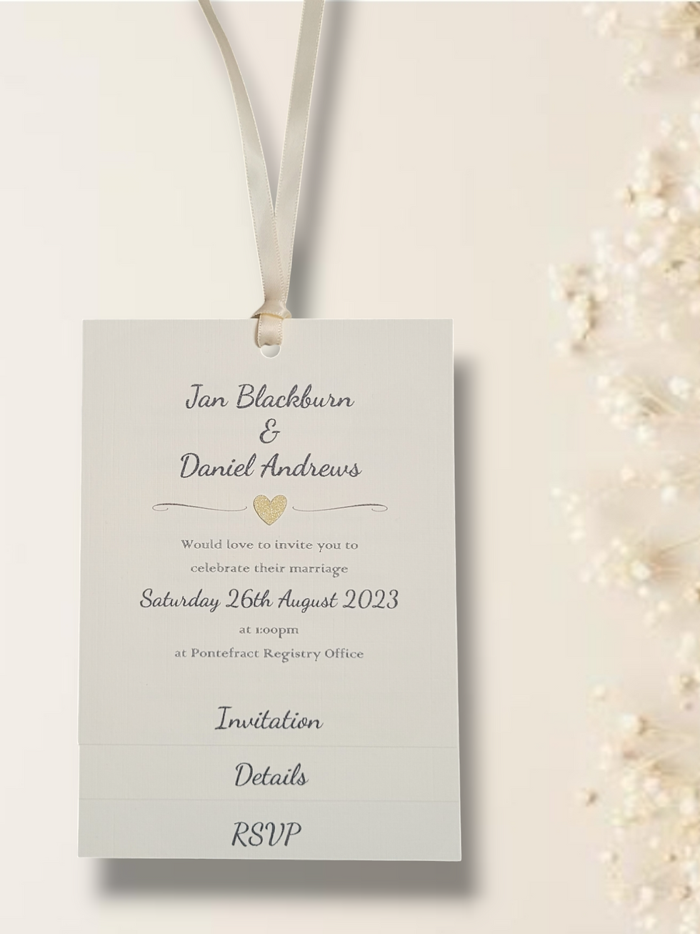 This image shows the Heart Design Tiered Invitation. There are 3 pages to include all the details of your big day.
