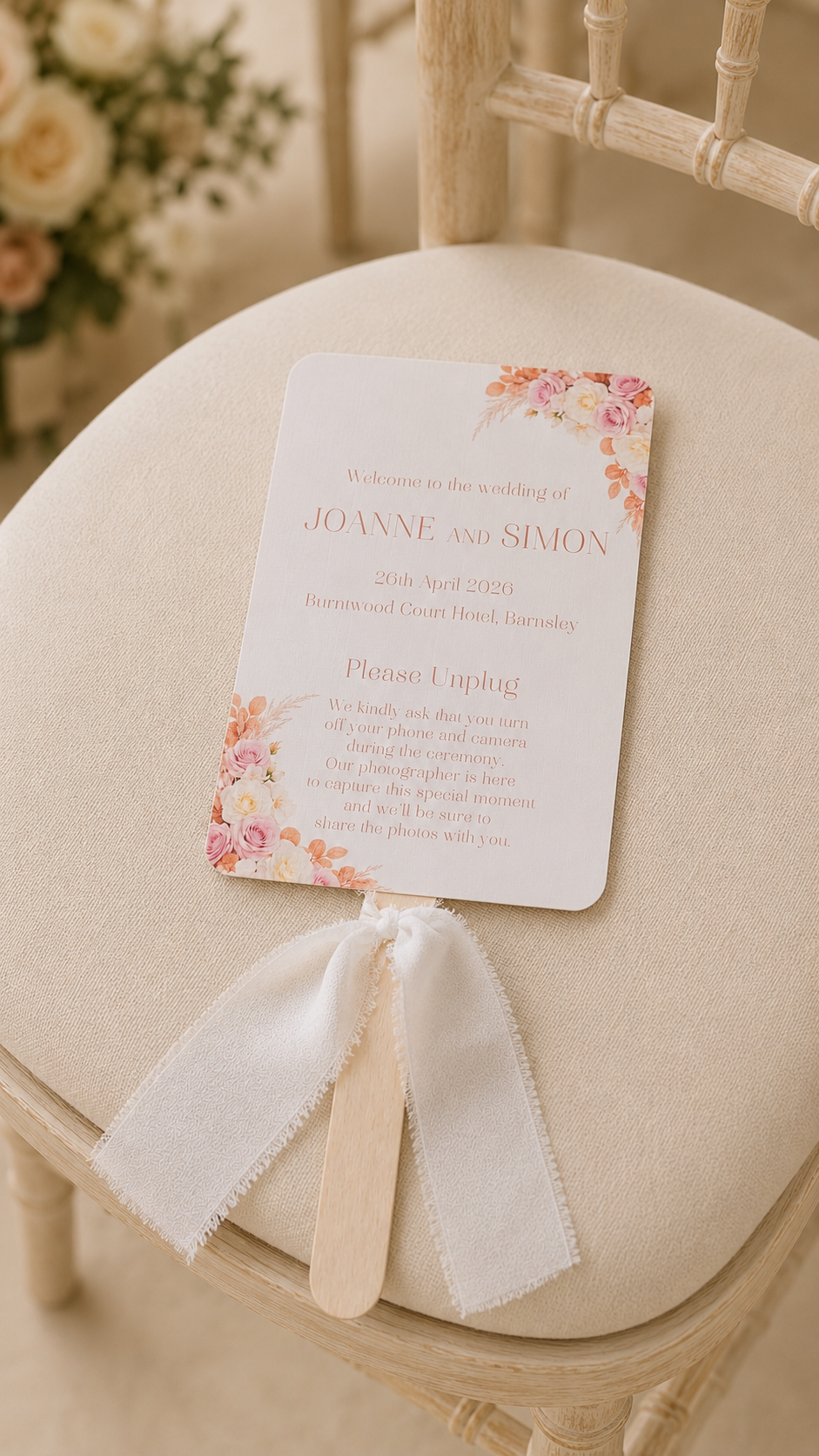 This image shows the front of the paddle fan, welcoming guests and stating its an unplugged wedding.