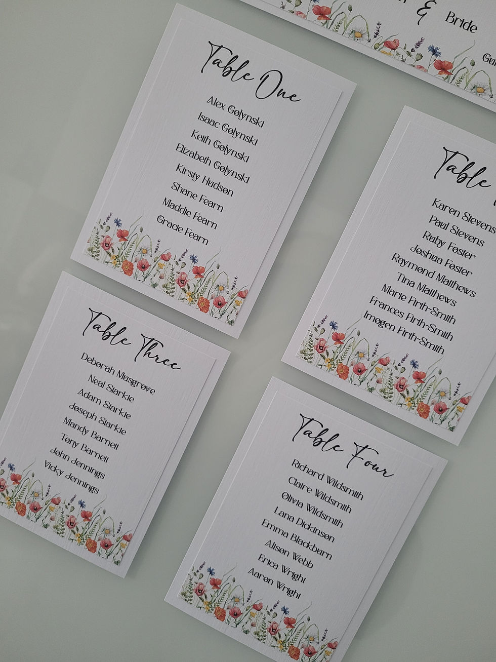 Thumbnail: This image shows a close up of the Guest Table Cards in the Wildflower Design.