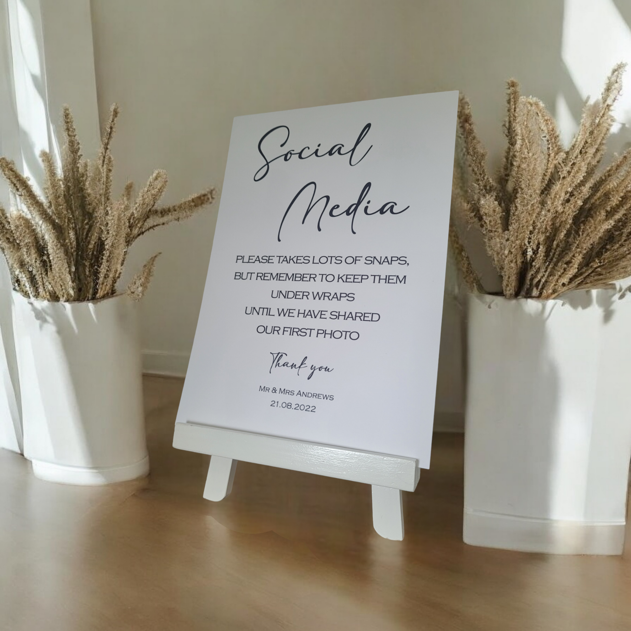 Our minimalist social media sign are personalised with your names and wedding date at the bottom.