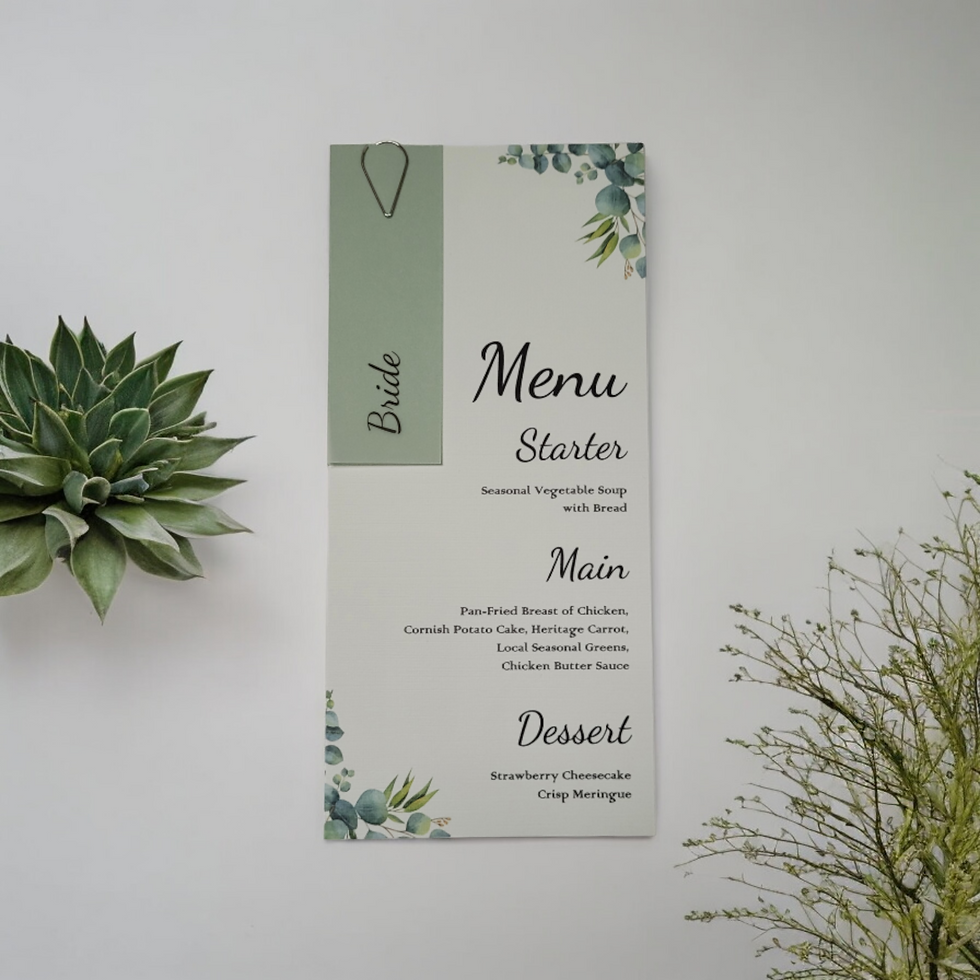 Thumbnail: Eucalyptus Design Menu Card has a vellum tag with the guest’s name and their menu choices are printed on the long card.