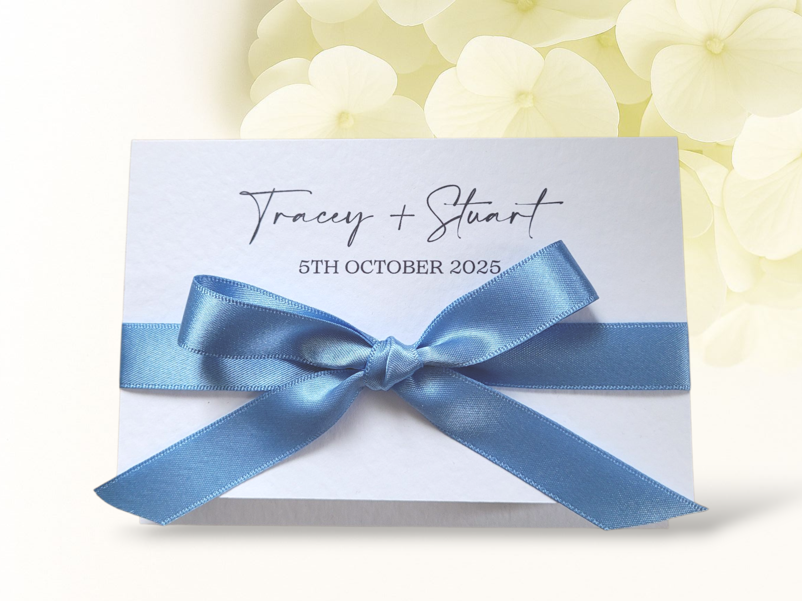 Our Bella Bow Design Pocket Fold Day Invitation features a large satin bow in the colour of your choice.