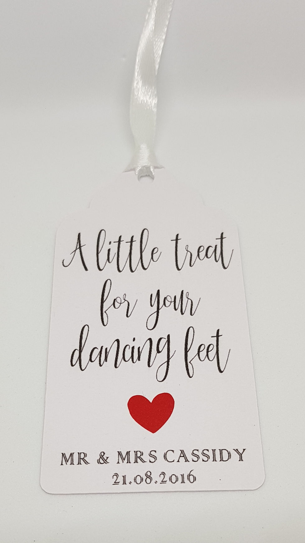 Thumbnail: A little treat for your dancing feet Tag with ribbon, red heart. Your Names and Wedding Date are at the bottom.