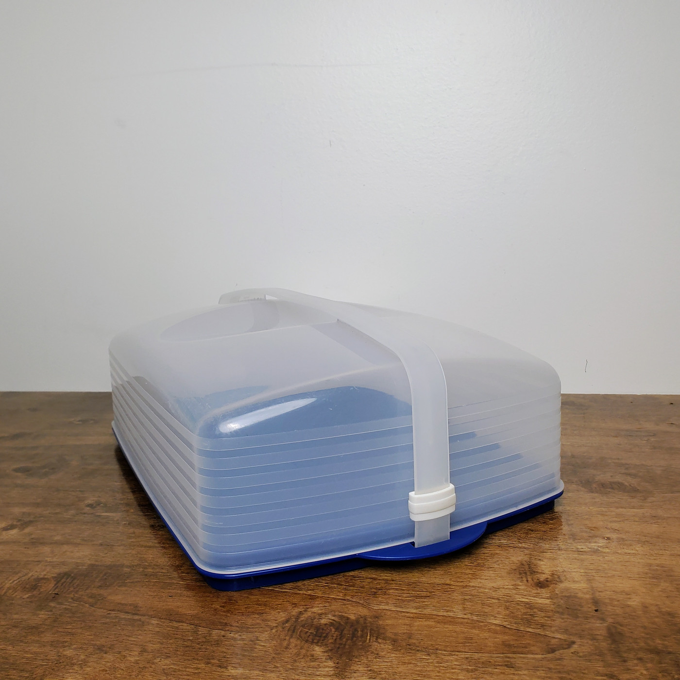 Blue and clear rectangular Bake N Take cake carrier.