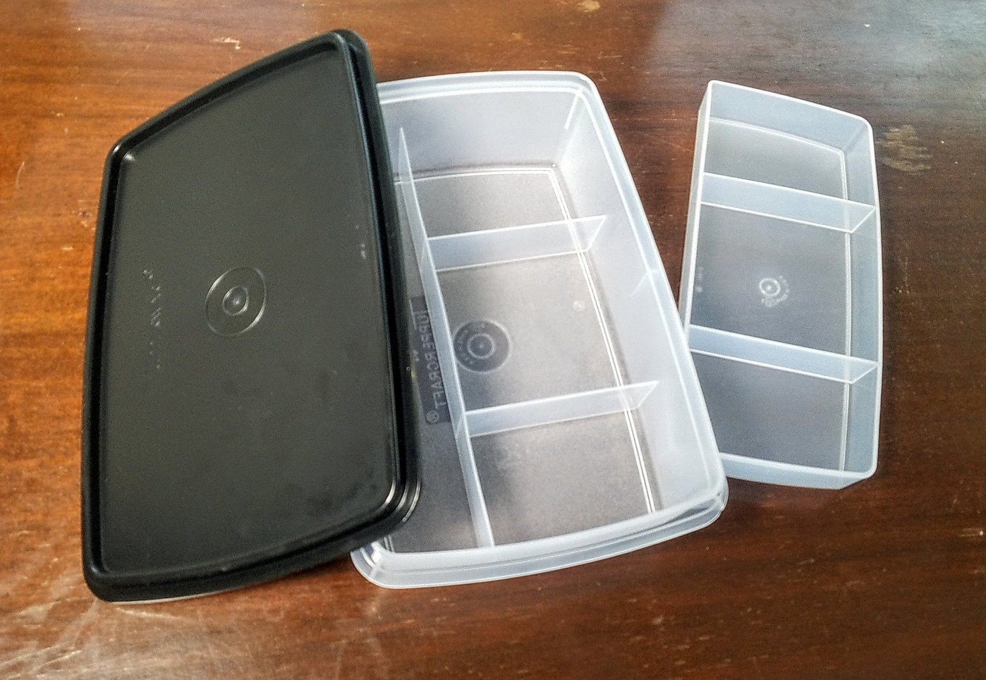 Tupperware 3-piece divided hobby container with a clear tray for small hobby parts.