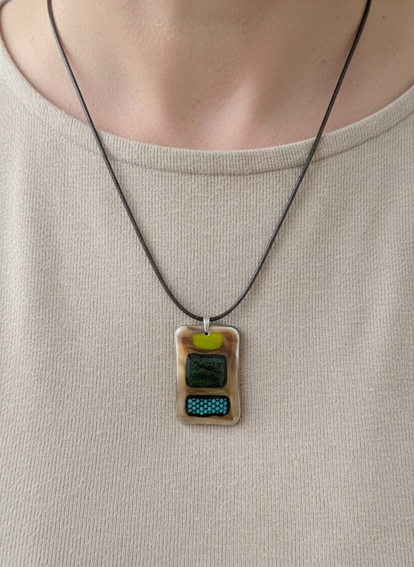 Unique Dichroic Fused Glass Necklace On A Decorative Beige Glass