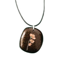 Black Dichroic Fused Glass Necklace With A Pale Orange Flower Motif