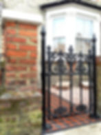 cast iron gate brick wall black and red victroian mosaic surbition kingston wimbledon london