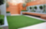modern garden design london raised beds hardwood slatted screen trellis fence fake grass flaoting be